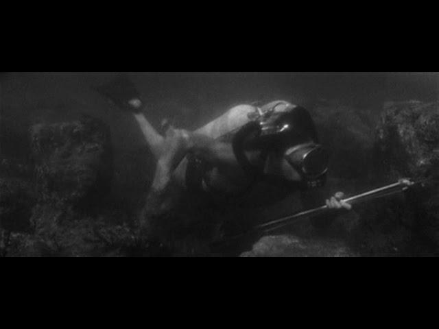 Bikini Woman dive with Vintage Scuba Diver