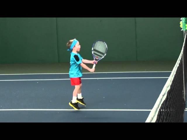 Max (4 years old) practices tennis