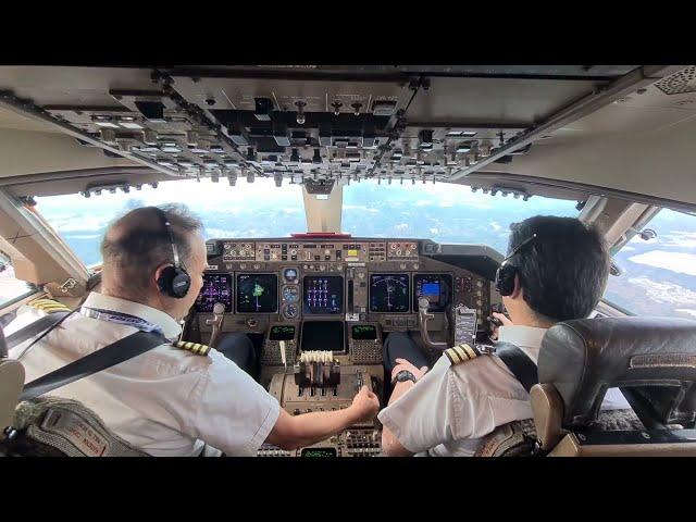 BOEING 747 LAND SOFTLY  in ATLANTA AIRPORT.  Controller: "Vacate to the left, no rush at all." 