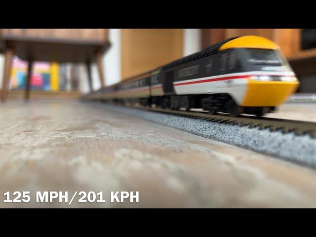 Model trains running at scale speed