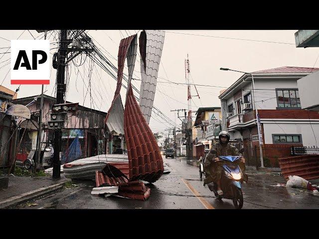 Typhoon Man-yi blows off roofs and brings flooding to the Philippines