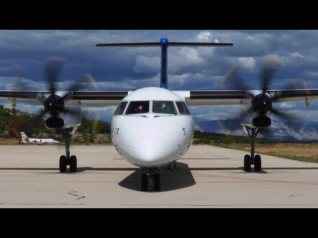 CLOSE-UP Friendly Pilots Waving - SkyAlps Bombardier Dash 8 Q400 Takeoff