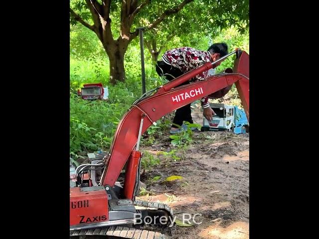 Borey RC teams is refilling up the lake near construction site.  #excavator #rccars #rctruck