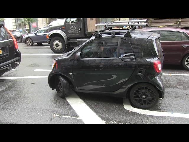 Shaquille O'Neal seen driving a smart car around NYC!!