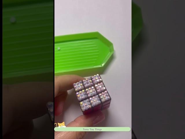 Bedazzling a miniature Rubiks cube. #miniature #bedazzled #cute