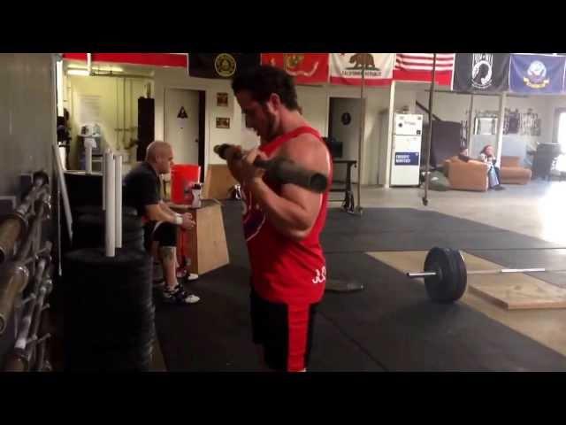 Strongman Kalle Beck Trains Arms