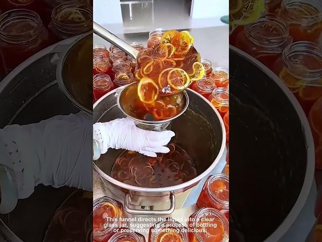 Woman Bottling Delicious Amber Concoction at Home