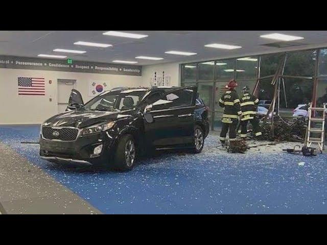 Car bursts through Oviedo taekwondo school