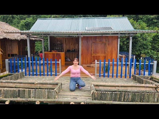 Girl making a flower garden on the water.