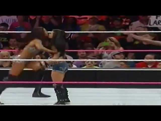 Alicia Fox towers over Aj Lee