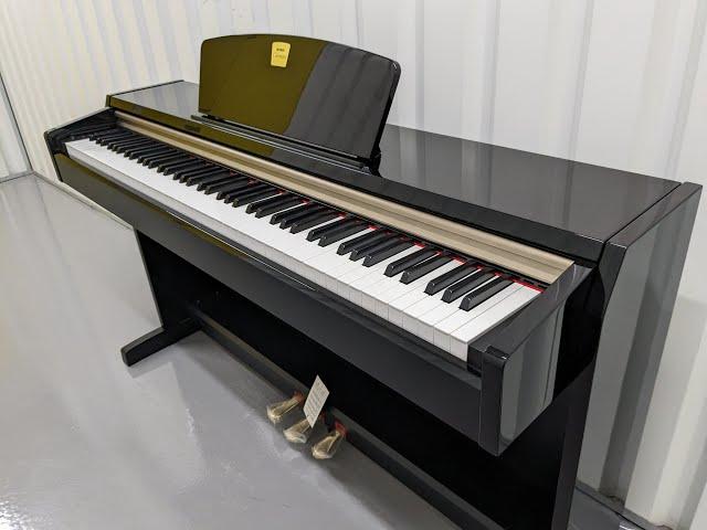 Yamaha Clavinova CLP-220PE digital piano in glossy black polished ebony stock number 23051