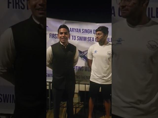 Shri Pawan K Pal Secratery to Consul General of India in Israel blessing Aryan before the swim 4 am