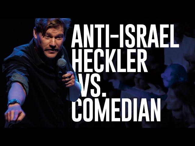 Comedian wins over extremely HOSTILE heckler | Shahak Shapira