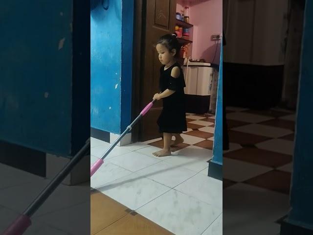 my little girl moping floor 