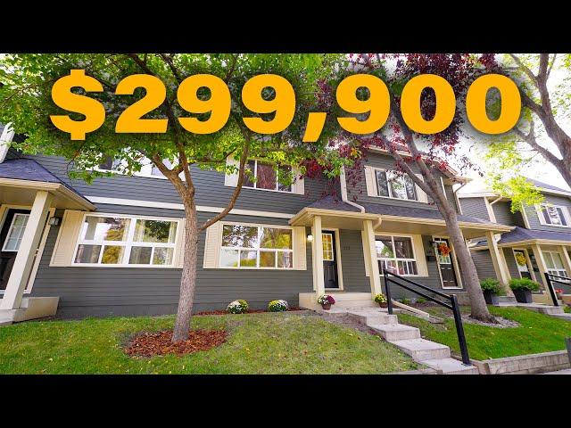 Tour a renovated $299,900, Three bedroom townhouse near Fish Creek Park in Queenlsand, SE Calgary!