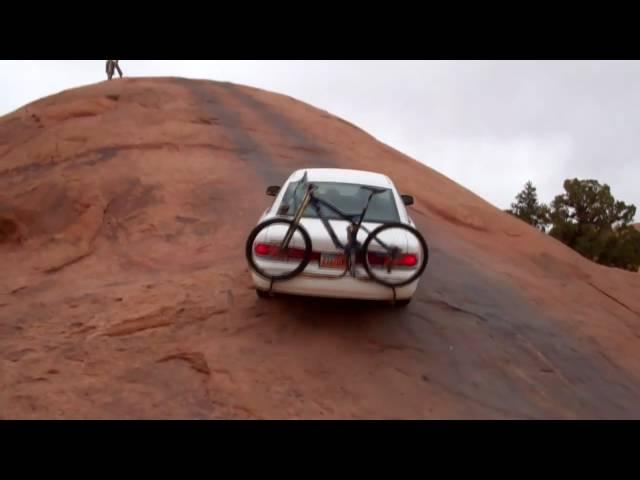 Moab rock crawling in a Crown Victoria - baby lions back slick rock jeep climb