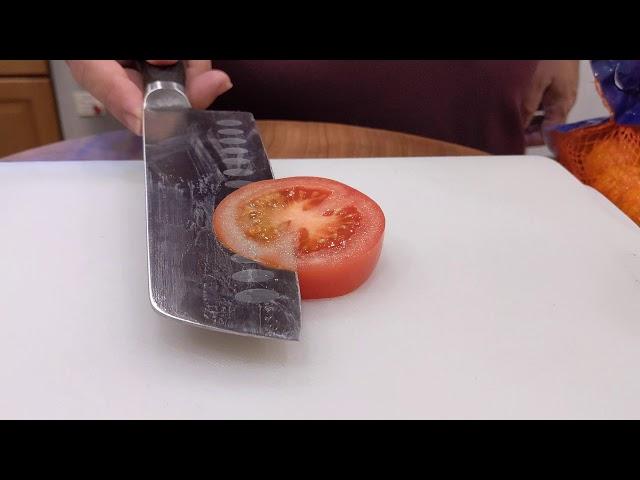 How sharp is Sam the Cooking Guy's knife?  This Sharp
