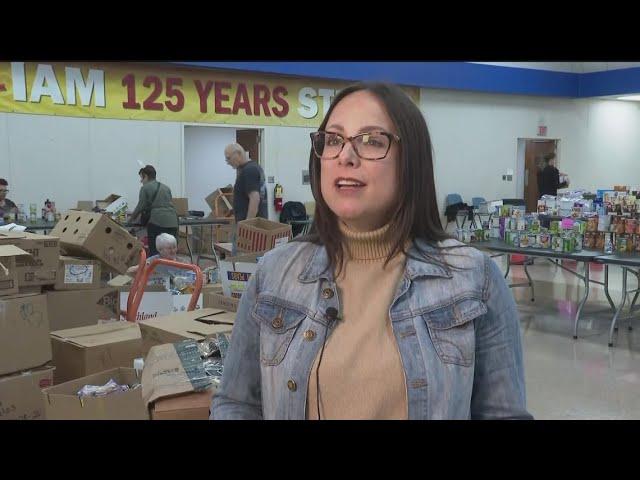 Volunteers in Cobb County coming together to sort, pack food for hundreds of families