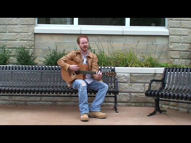 Danny Burns sings  Golden  on Floyd's Bench, Muskegon, MI