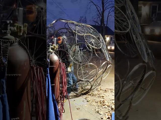 Welding Huge Bicycle Wheel Icosahedron Sculpture