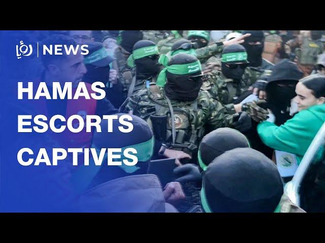 Footage of Hamas delivering “Israeli” captives to Red Cross in Gaza