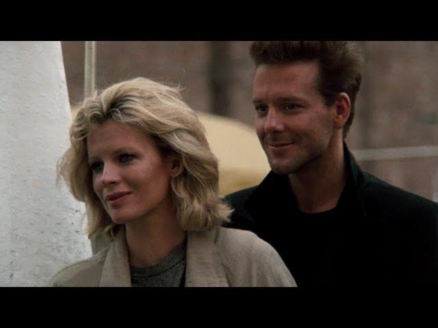 Mickey Rourke and Kim Basinger. "Nine 1/2 Weeks" (1985). Bryan Ferry - Slave To Love.