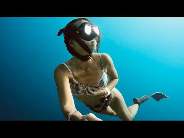 Freediving Girl Exploring the Sea at Maldives 