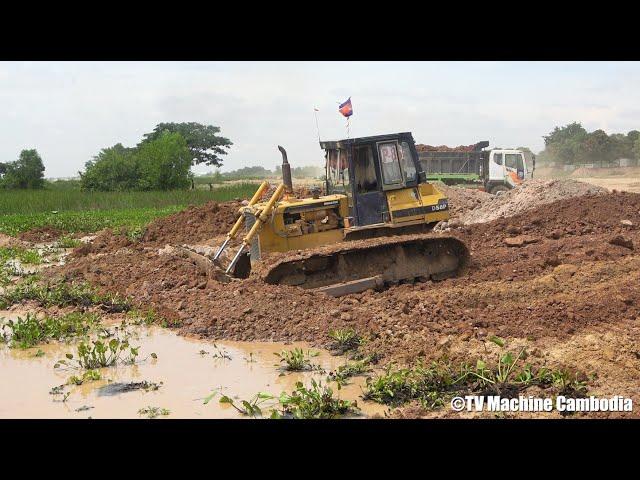 Best Komatsu Bulldozer D58P Operating Pushing Off Dirt, Dumping a Load Of Dirt Truck