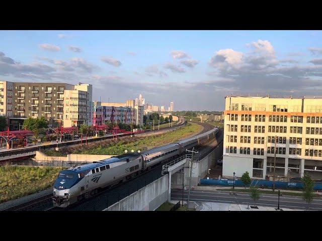 Amtrak train with Charlotte skyline #cities #trains #travel