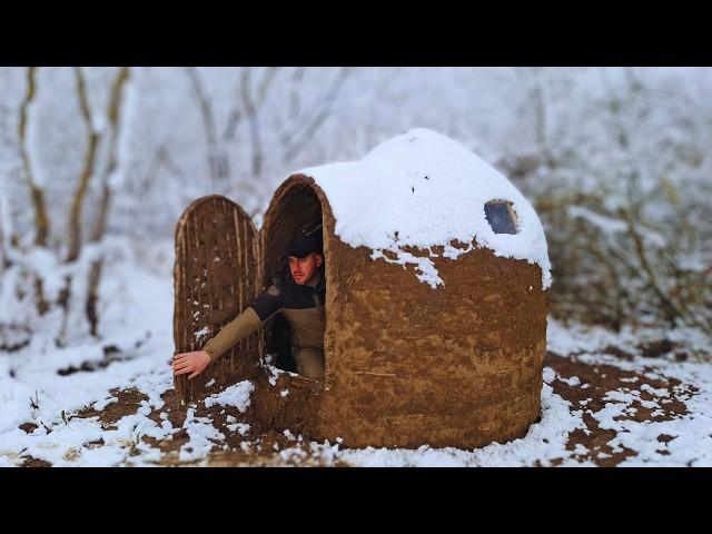 Building a bushcraft shelter for winter survival in the wilderness