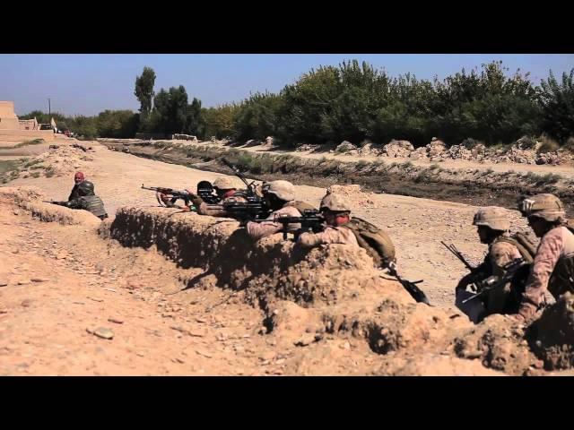 U.S. Marines with ANA run towards gunfire at Nawa, Afghanistan