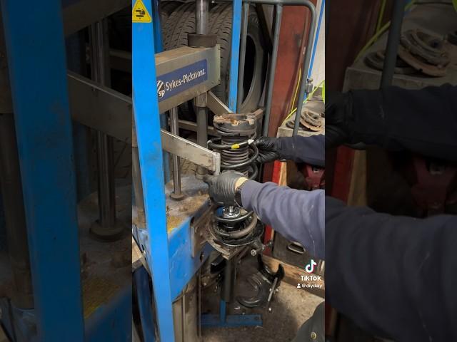 Sykes Pickavant spring compressor making the job easy.#sykespickavant
