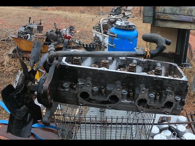 Waste Oil burner Melting a scrap Aluminum Head and lawnmower motor