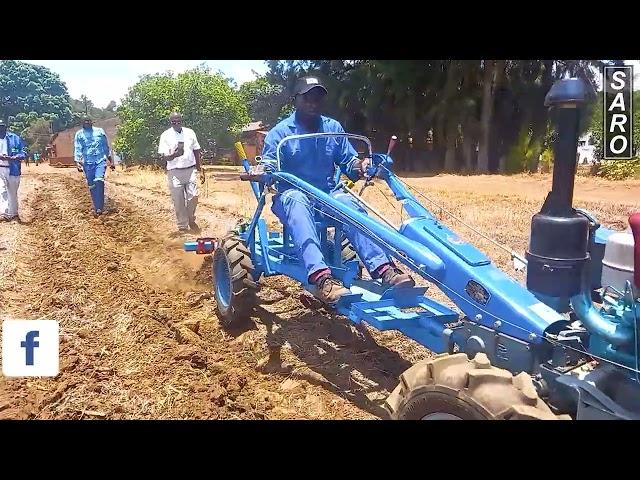 Two Wheel tractor with a plough attached to our very own SARO manufactured tool carrier