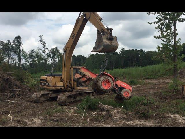 How To: Unstick A Tractor! Stuck Tractor Excavator Trackhoe Rescue