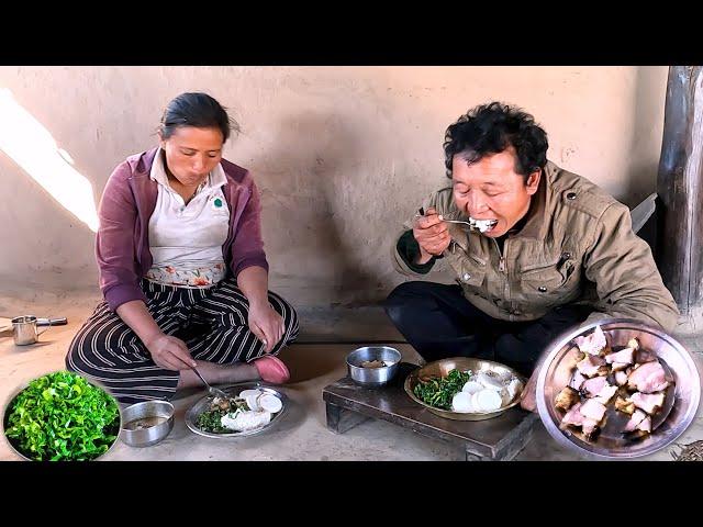 Sharmila  cooking pork & mustard greens curry for lunch