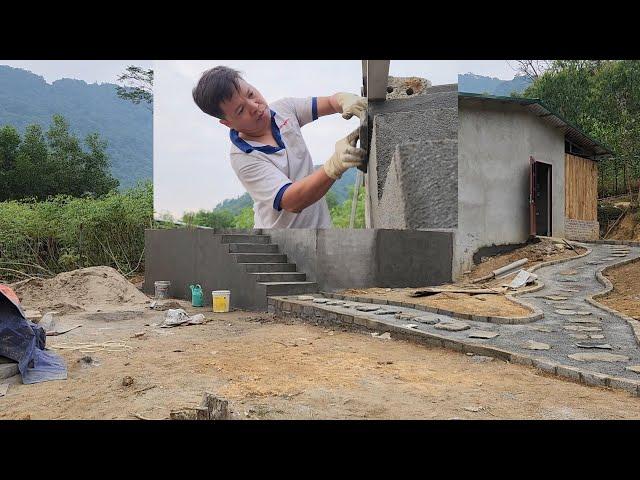 Plastering the walls around the balcony.