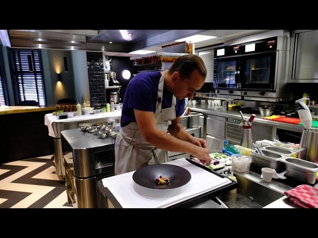 Chef Jan Sobecki prepares a vegetarian beet dish in restaurant Tribeca, Heeze, The Netherlands