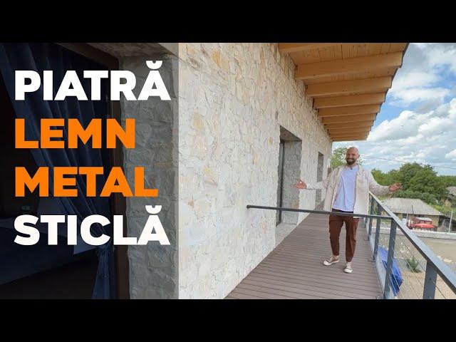 Piatră. Lemn. Metal. Sticlă. Casa de vis pentru romantici.