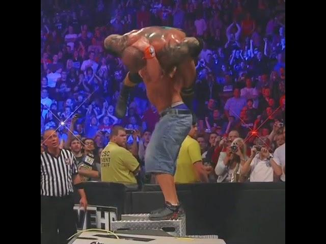 John Cena Attitude Adjustment Dave Bautista Through the Table