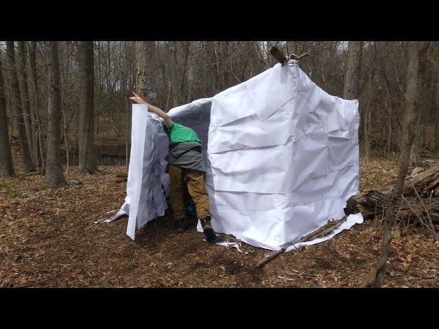 Sleeping In Paper Shelter In The Forest