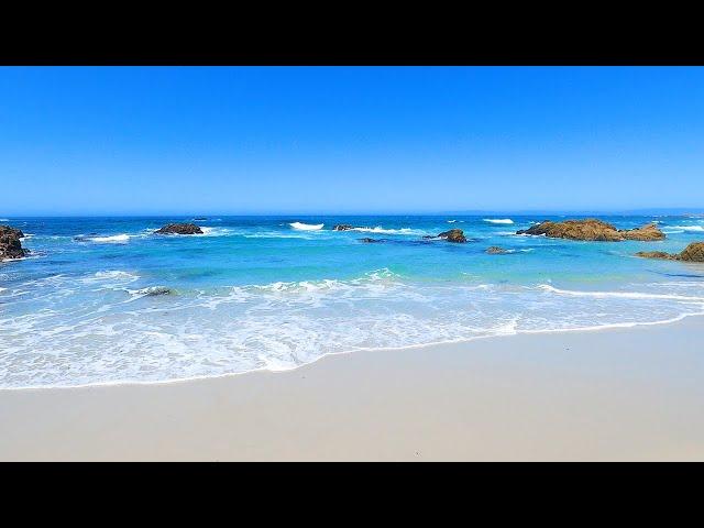 Rhythmic Waves Crashing on a Beautiful Beach in California