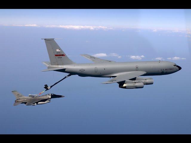 KC-135 Tanker refueling a Jet Fighter