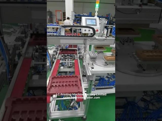 Automatic pad printing machine with manipulator unloading and dryer