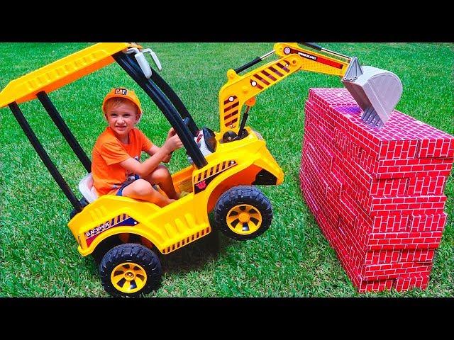 Tractor breaks down the walls - Vlad ride on power wheel to help kid