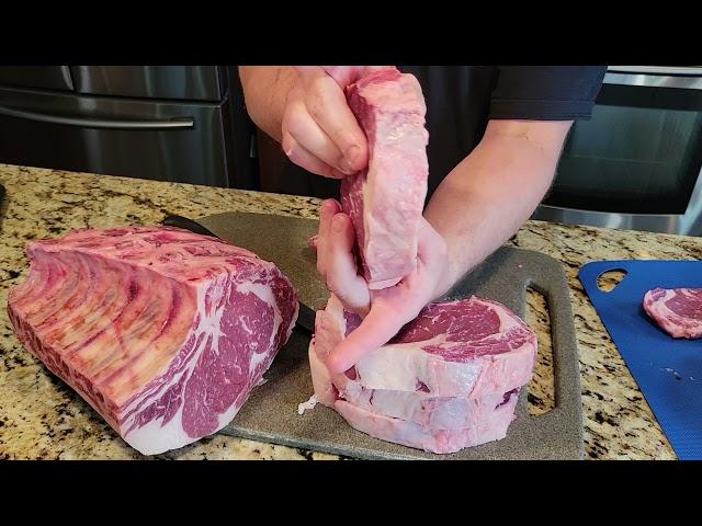 How to cut a bone-in rib roast into boneless rib eye steaks