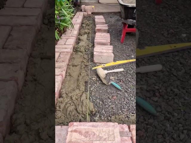 Paving patio with recycled red bricks.  #garden #landscaping #landscape  #paving #diy