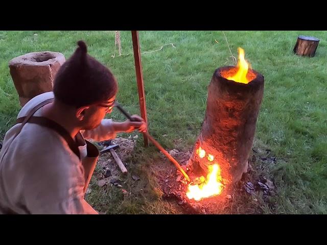 Iron smelting in the early medieval slag drop shaft furnace, making iron