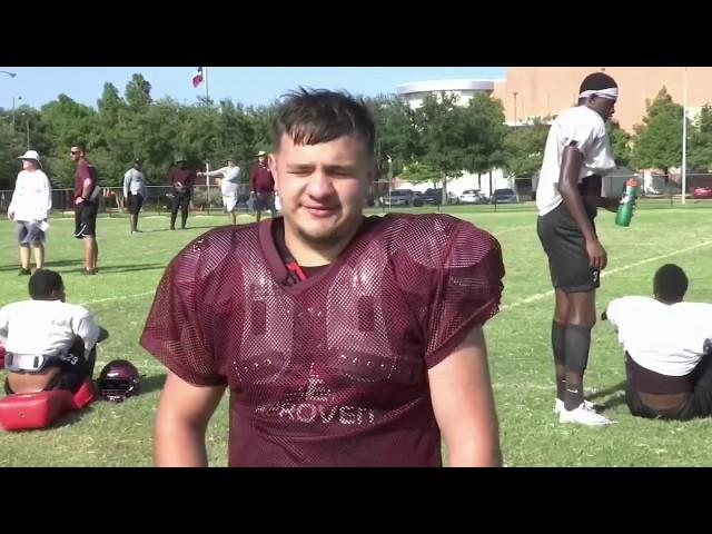 HS football player getting the job done despite hearing impairment