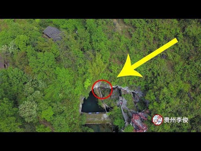 There is a natural stone arch bridge in a cave in the remote mountainous area of Guizhou.